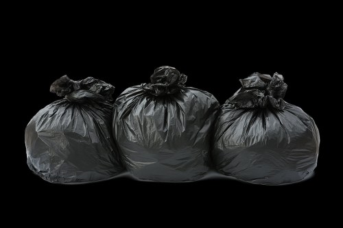 Various sizes of enclosed skips available for hire in Queens Park