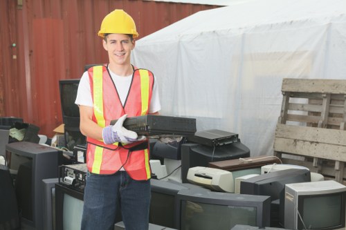 Professional garden waste removal service at work